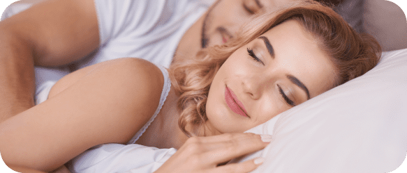 sleeping-couple-comfortable-bed 1